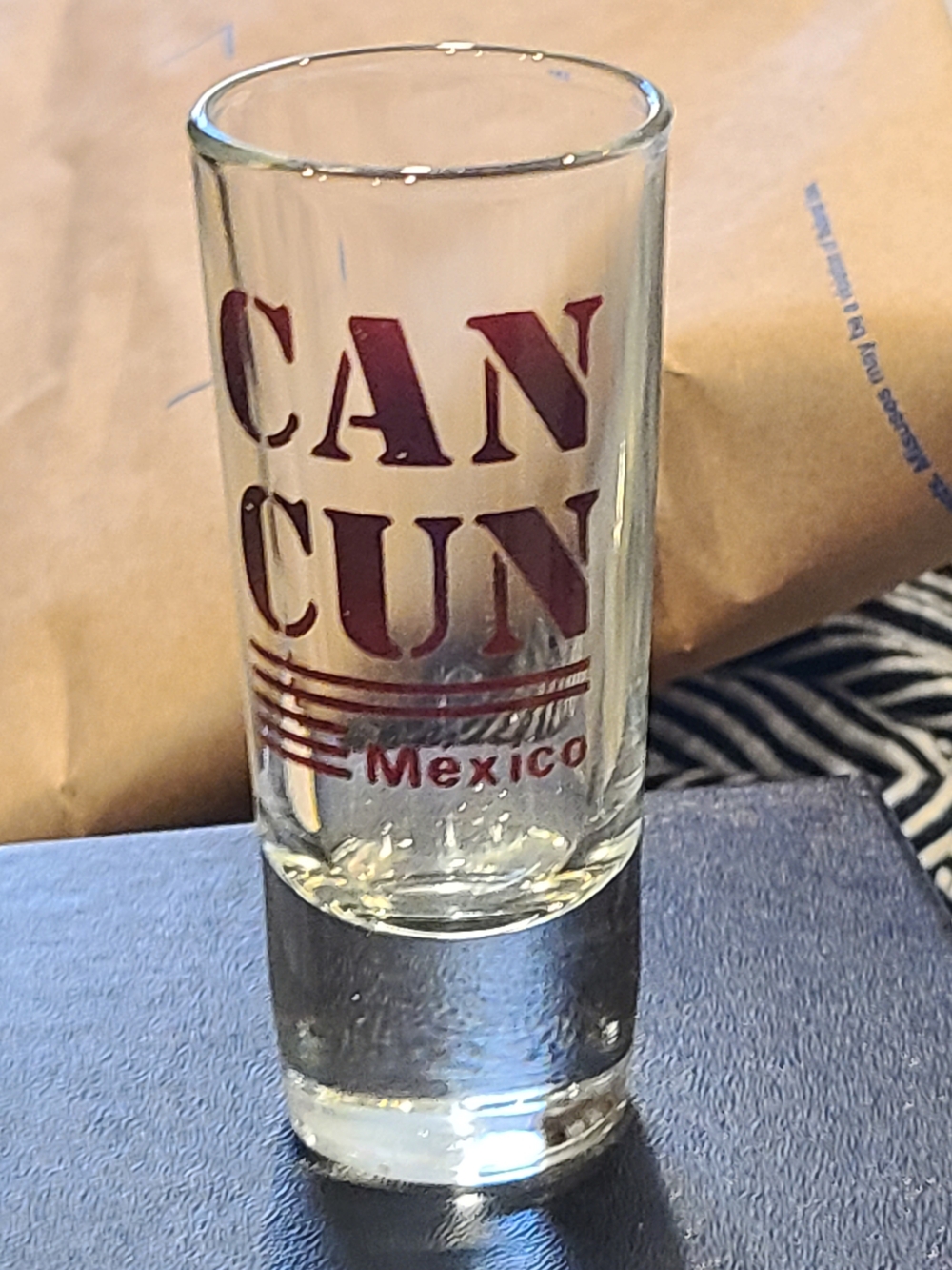 Vintage Clear Shot Glass with Maroon 'CANCUN' Logo
